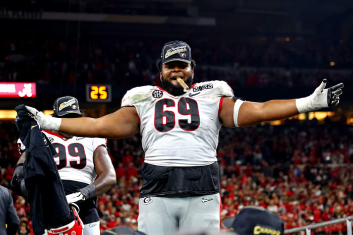 Jan 10, 2022; Indianapolis, IN, USA; Georgia Bulldogs offensive lineman Jamaree Salyer (69) celebrates after the Georgia Bulldogs beat the Alabama Crimson Tide in the 2022 CFP college football national championship game at Lucas Oil Stadium. Mandatory Credit: Mark J. Rebilas-USA TODAY Sports